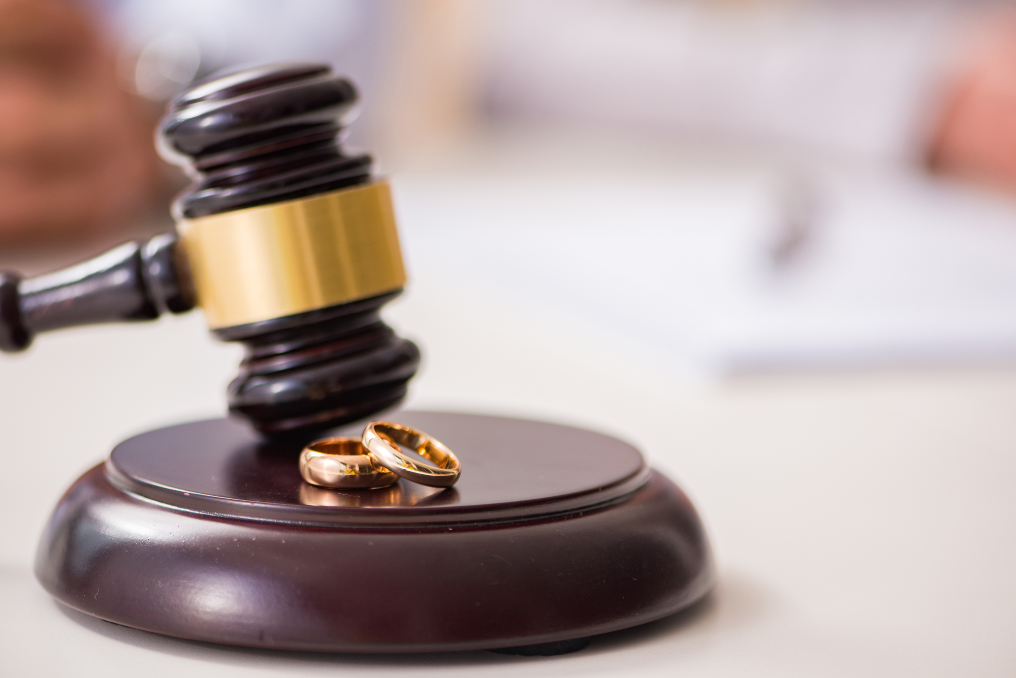 Judge gavel deciding on marriage divorce